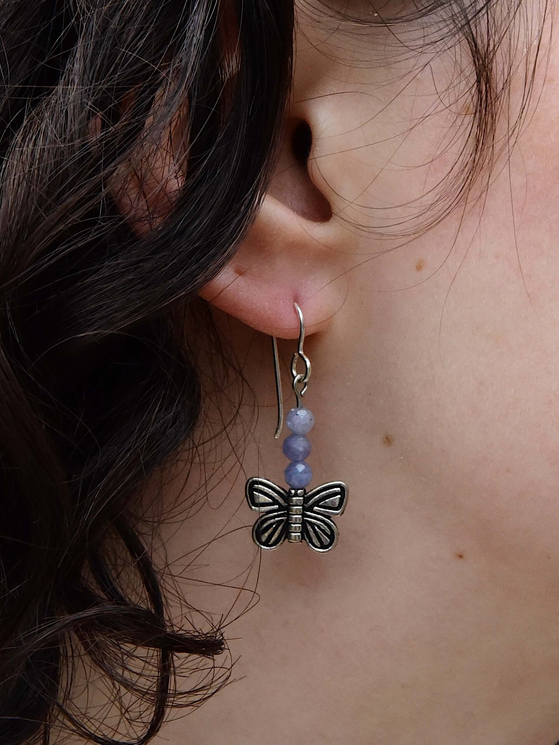 Devon's Butterfly Earrings These earrings are made with genuine Tanzanite stones with a pewter Butterfly. All profits from the sale of these earrings will be donated to the Pediatric Heart Program at Children's Hospital MN in memory of Devon Jenson, the h