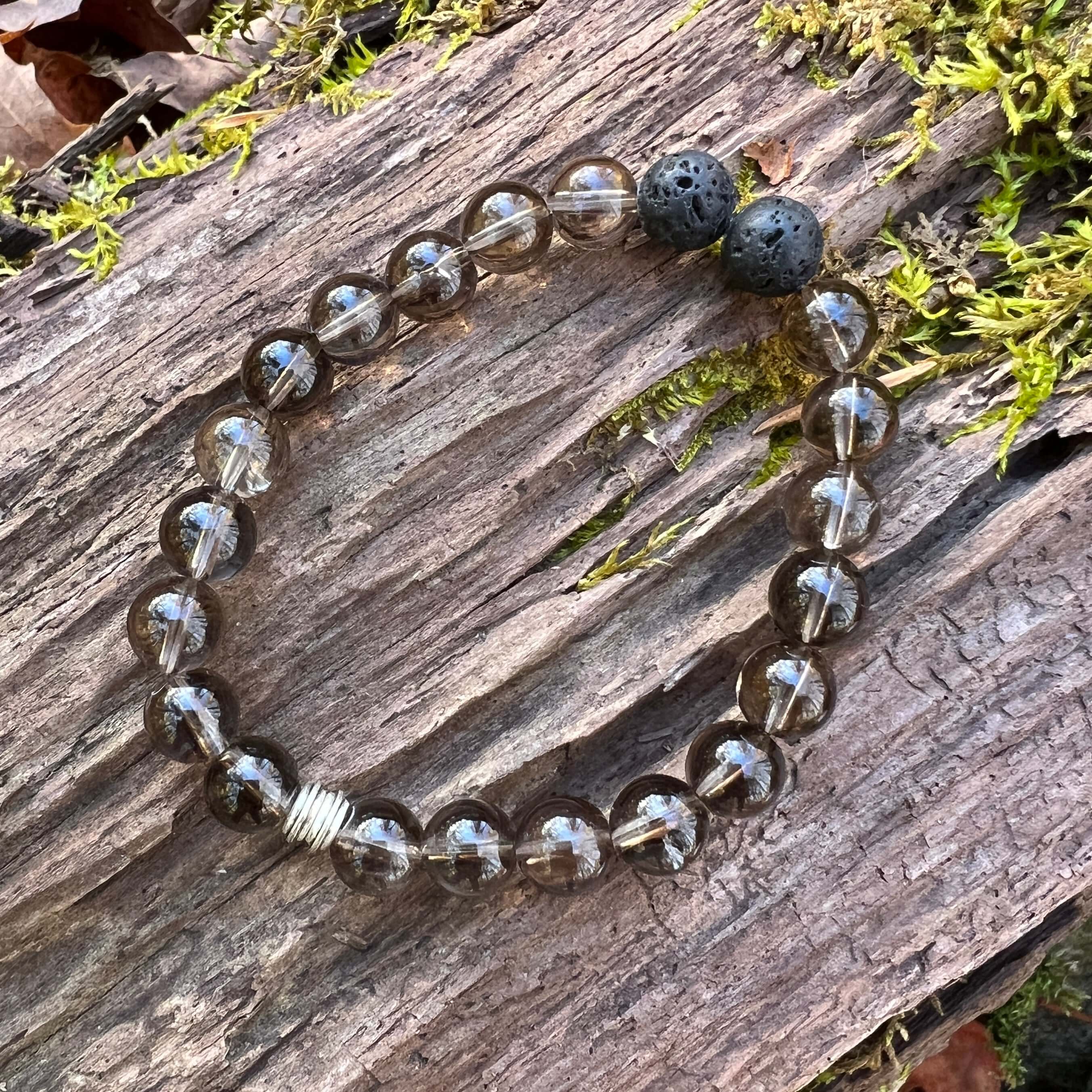 Smoky Quartz Bracelet This bracelet is made with high-quality Smoky Quartz gemstones which bring stress relief and protection from negativity to the wearer. Zodiac Signs: Scorpio, Sagittarius, and Capricorn. Chakras: Root and Solar Plexus. Handmade with a