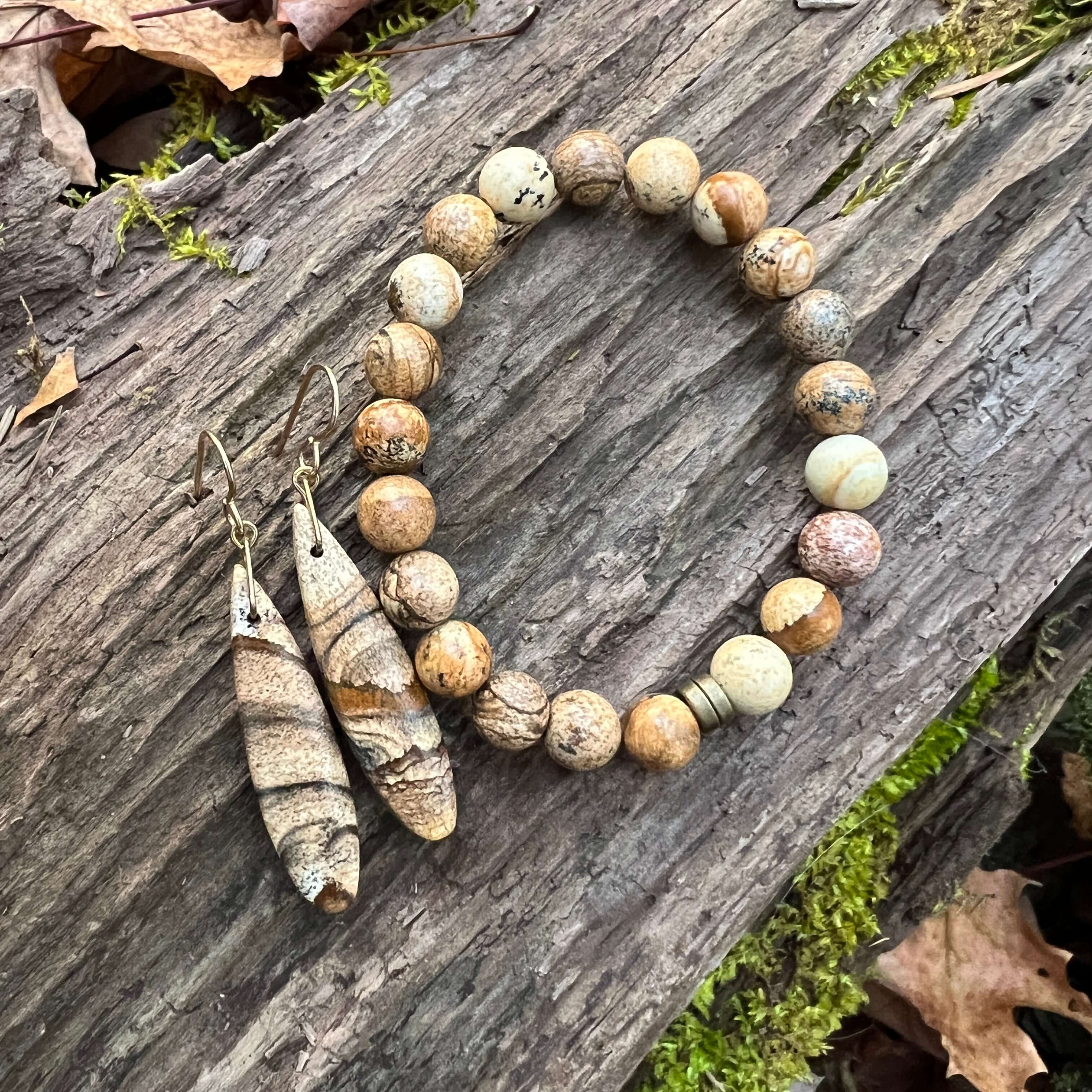 Picture Jasper Earrings These earrings are made with high-quality Picture Jasper gemstones which bring confidence and courage to the wearer. Zodiac Signs: Leo and Capricorn. Chakras: Root and Third Eye. Handmade with authentic crystals & gemstones in Minn