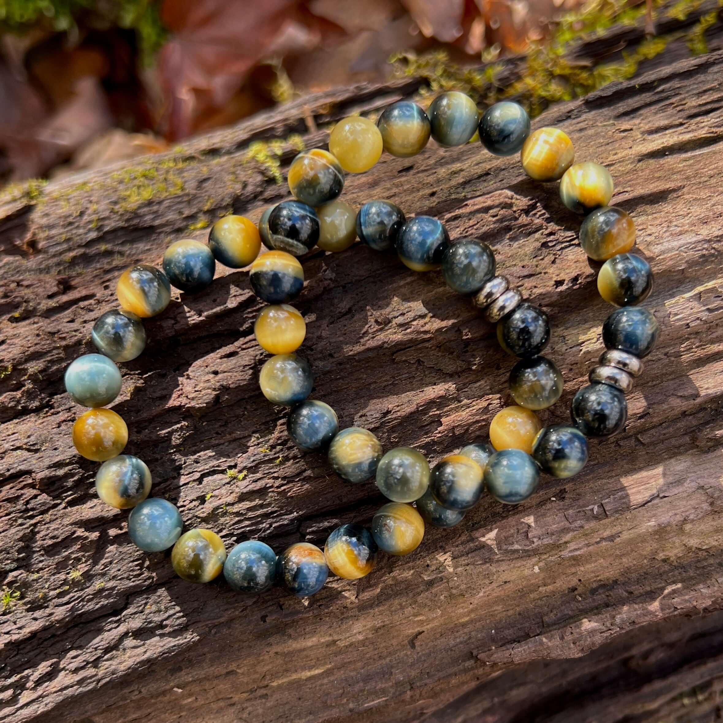 Blue and Blonde Tiger Eye Bead Bracelet This bracelet is made with high-quality Blue and Blonde Tiger Eye stones which bring confidence and optimism to the wearer. Zodiac Signs: Leo and Capricorn. Chakras: Root and Solar Plexus. Handmade with authentic cr
