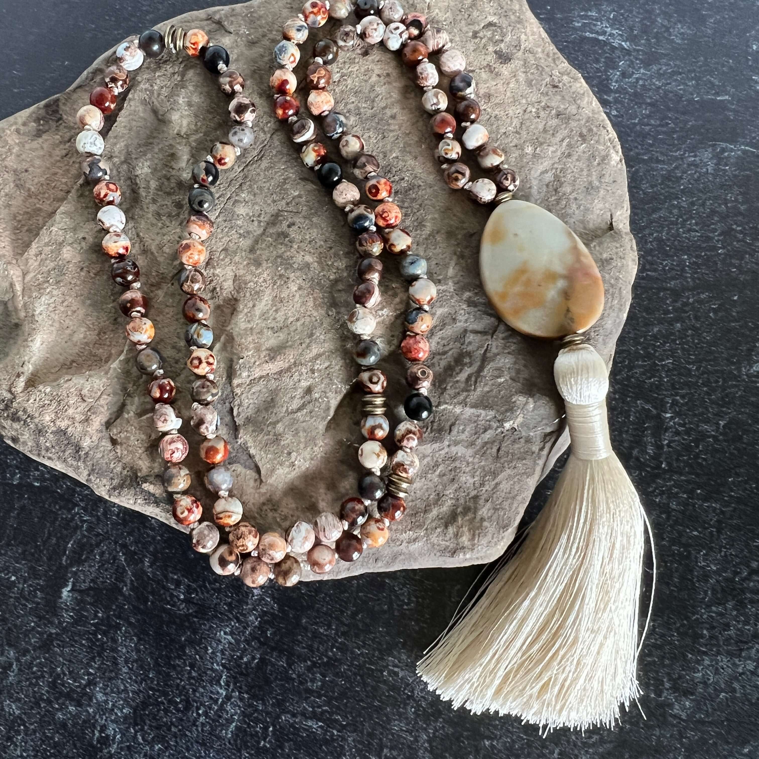 Ancient Cellar Black Agate Mala This mala is made with high-quality Ancient Cellar Agate & Amazonite stones which provide grounding, calmness and strength to its wearer.
