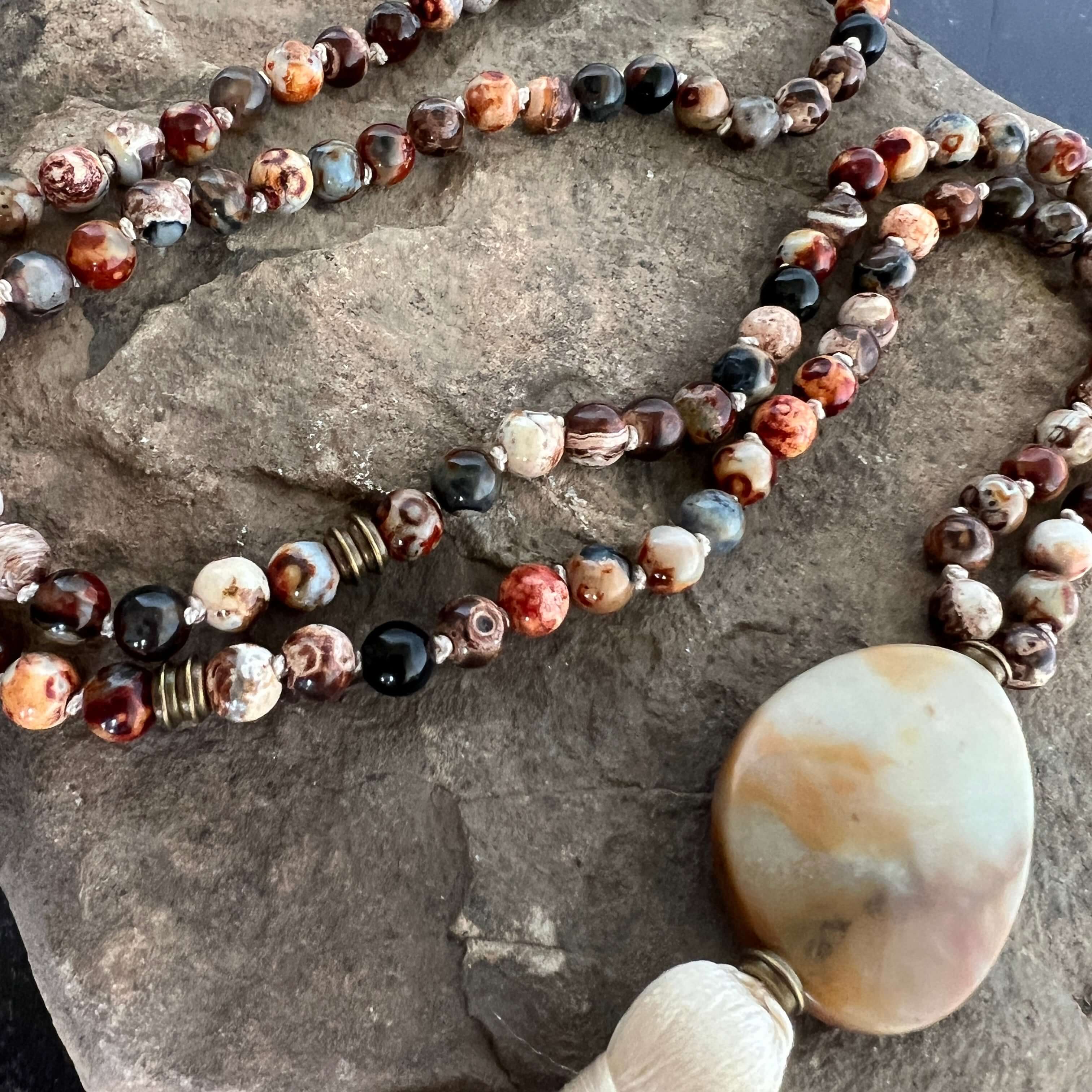 Ancient Cellar Black Agate Mala This mala is made with high-quality Ancient Cellar Agate & Amazonite stones which provide grounding, calmness and strength to its wearer.