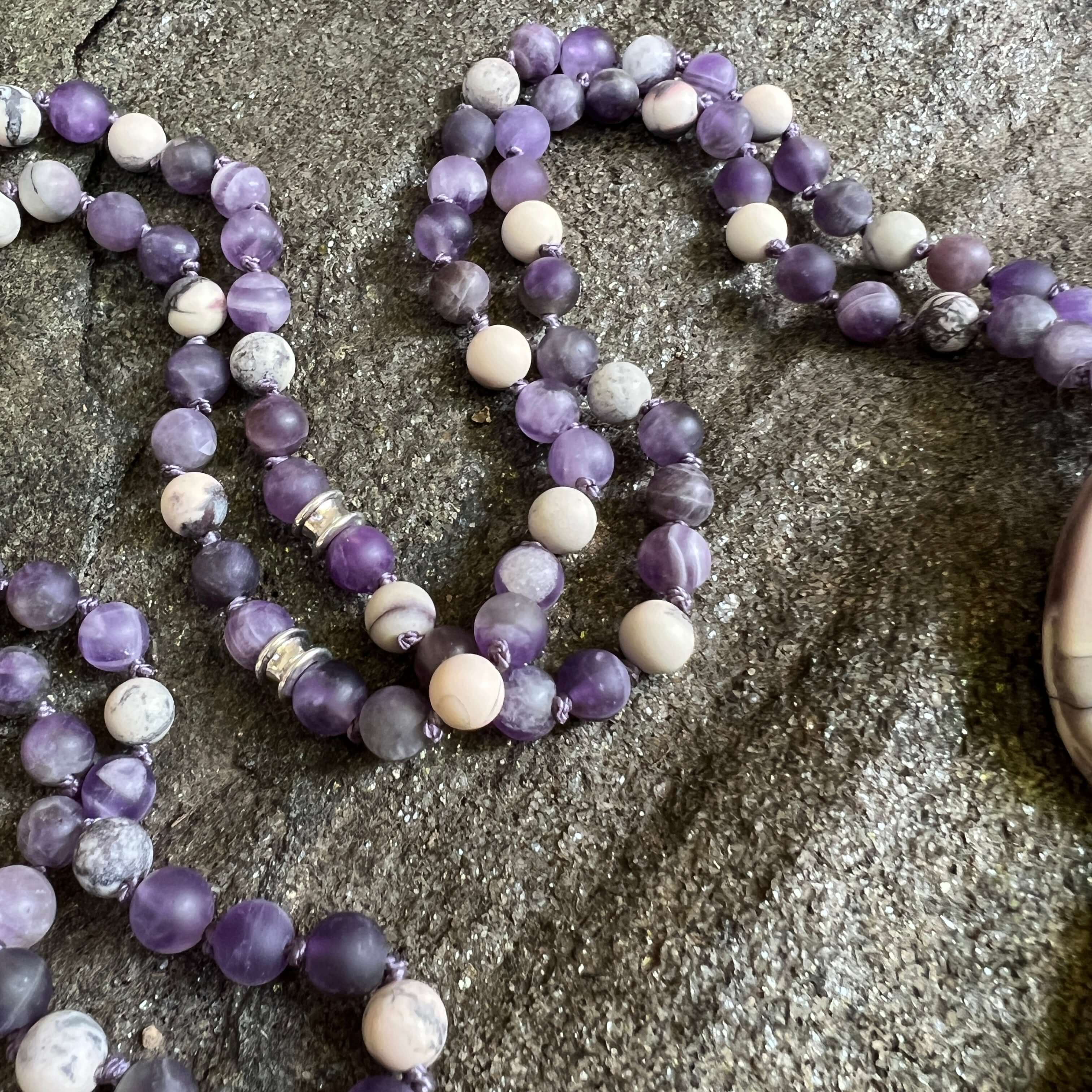 Third Eye Chakra Mala The Third Eye Chakra Mala is designed to help you tune into your inner voice and intuition. Handmade with multiple forms of matte Amethyst and Porcelain Jasper stones, the Third Eye Chakra Mala provides the wearer with energy that al