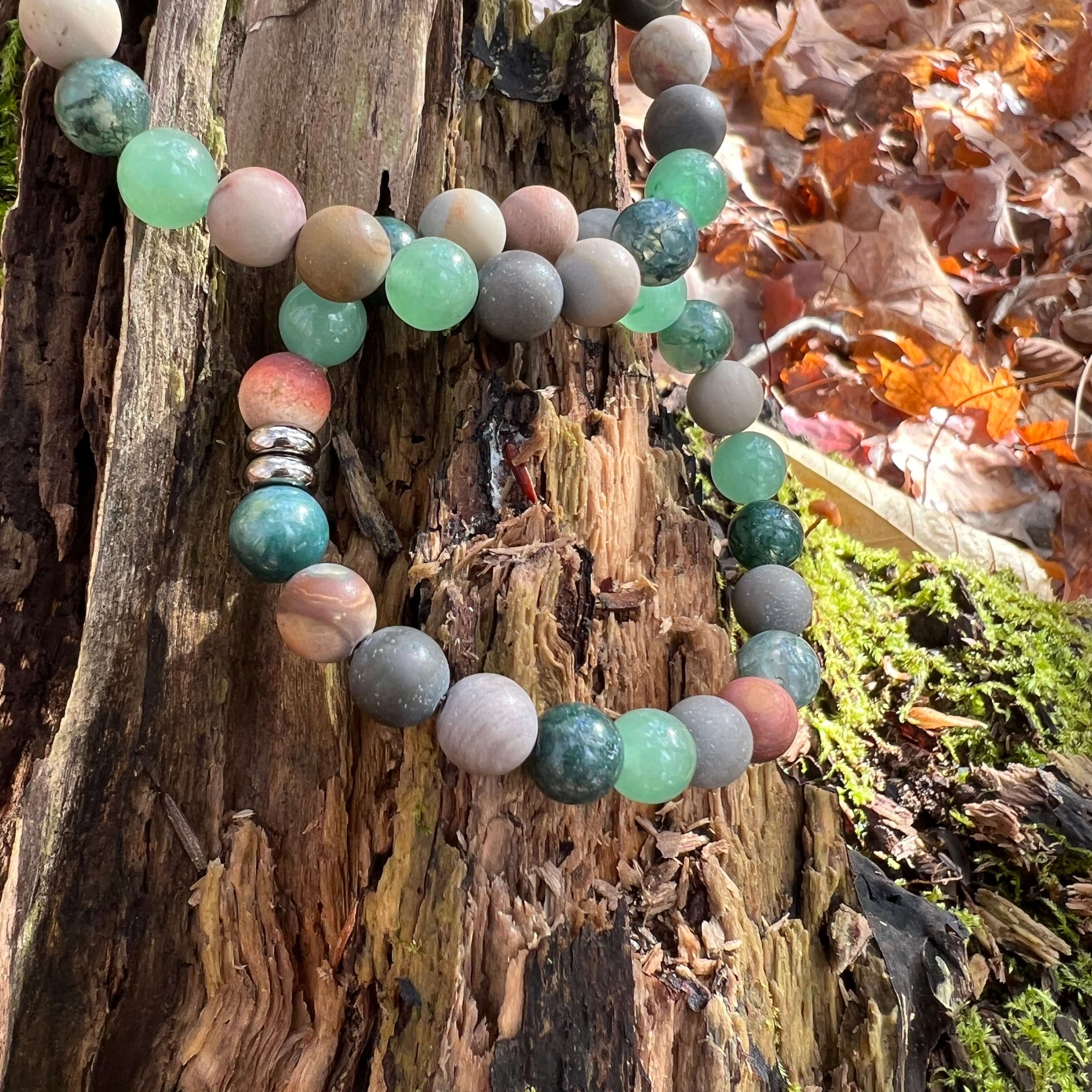 Earth Harmony Bracelet Our Earth Harmony Bracelet fuses the energies of Polychrome Jasper, Moss Agate, and Green Aventurine, which brings the wearer a sense of emotional balance, inner growth, and grounding energy.