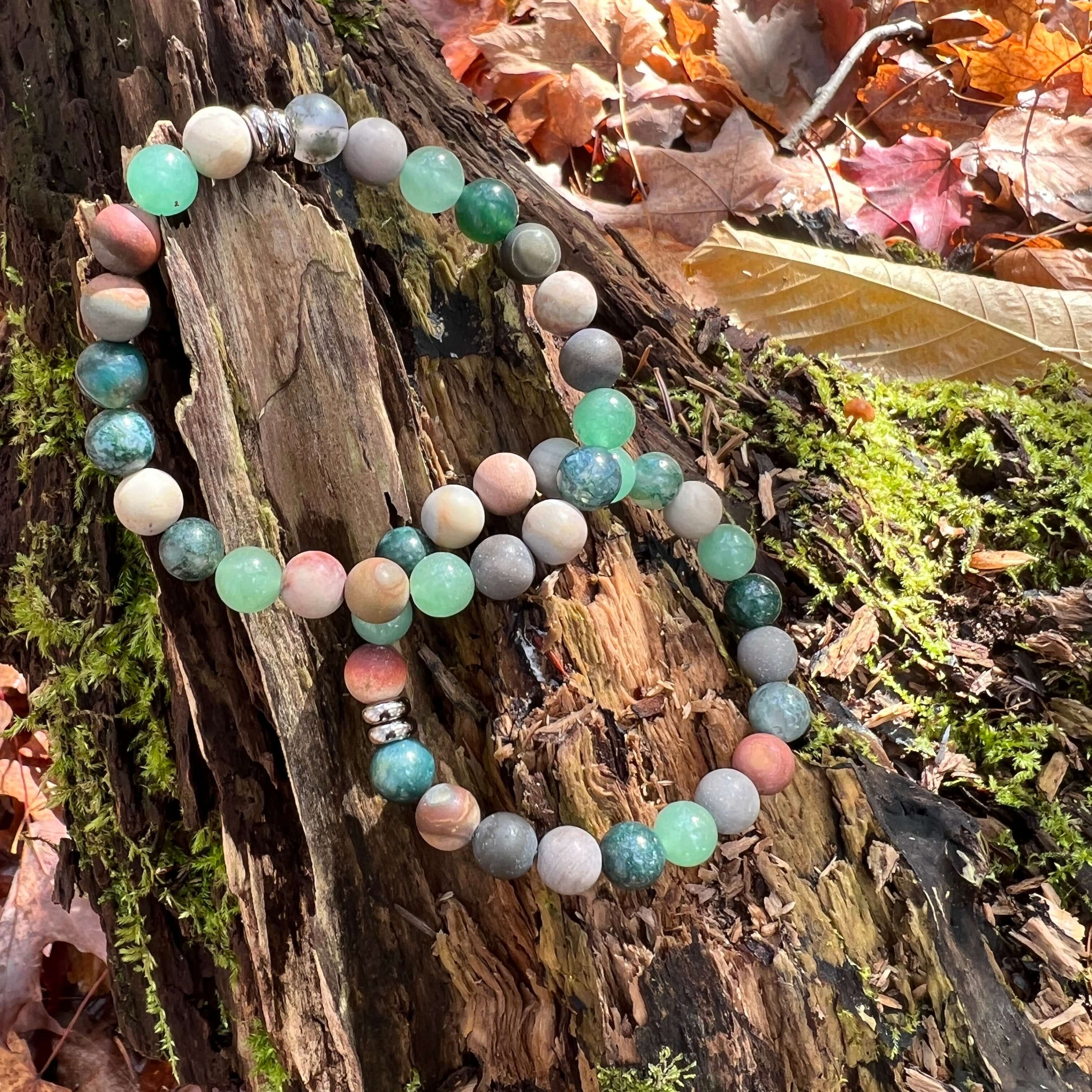 Earth Harmony Bracelet Our Earth Harmony Bracelet fuses the energies of Polychrome Jasper, Moss Agate, and Green Aventurine, which brings the wearer a sense of emotional balance, inner growth, and grounding energy.