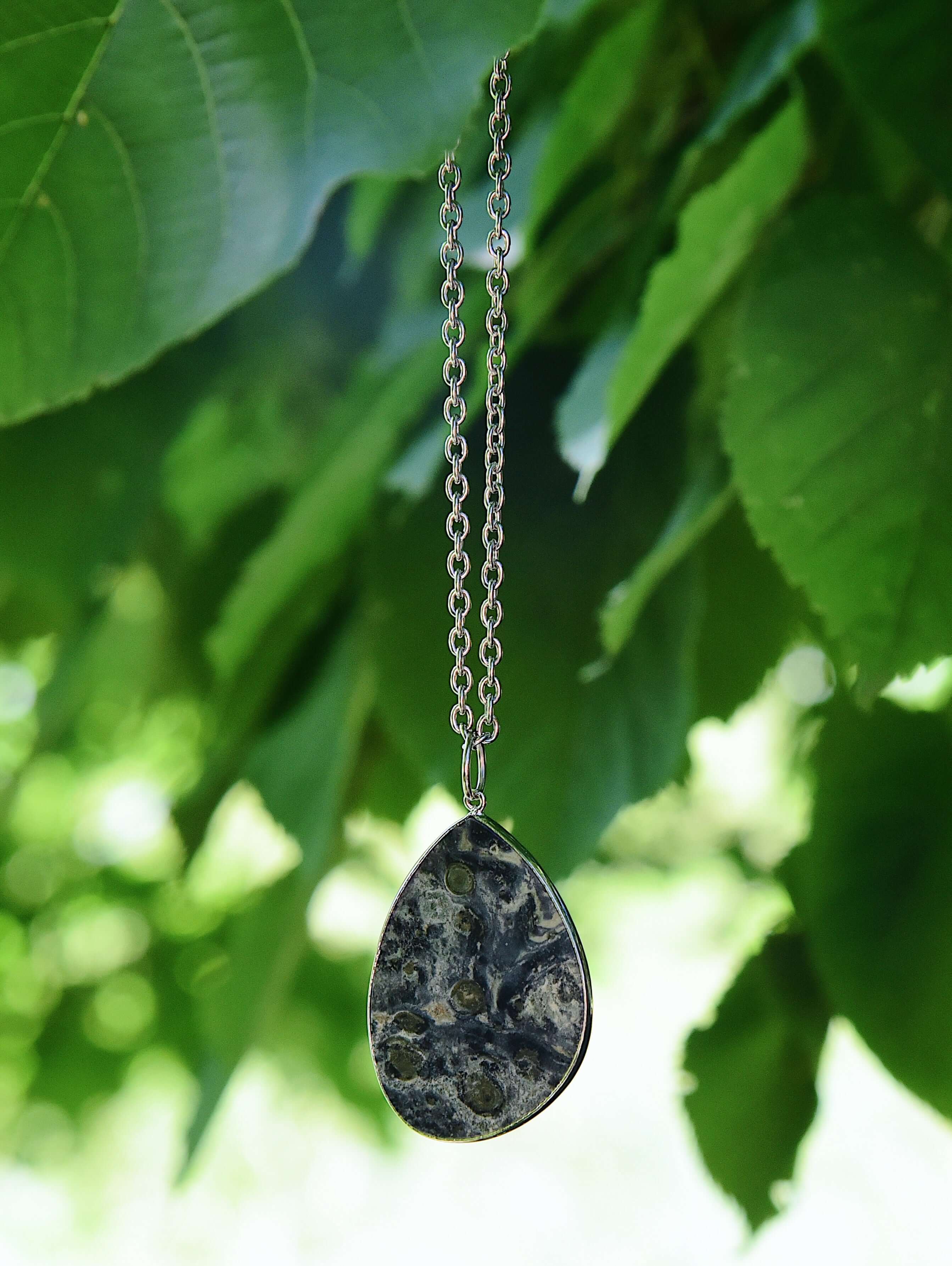 Kambaba Jasper Slice Necklace This necklace is made with a high-quality Kambaba Jasper stone which brings grounding and protection to the wearer. Kambaba Jasper calms the mind and promotes feelings of peace, reduces fear and increases self worth, bringing