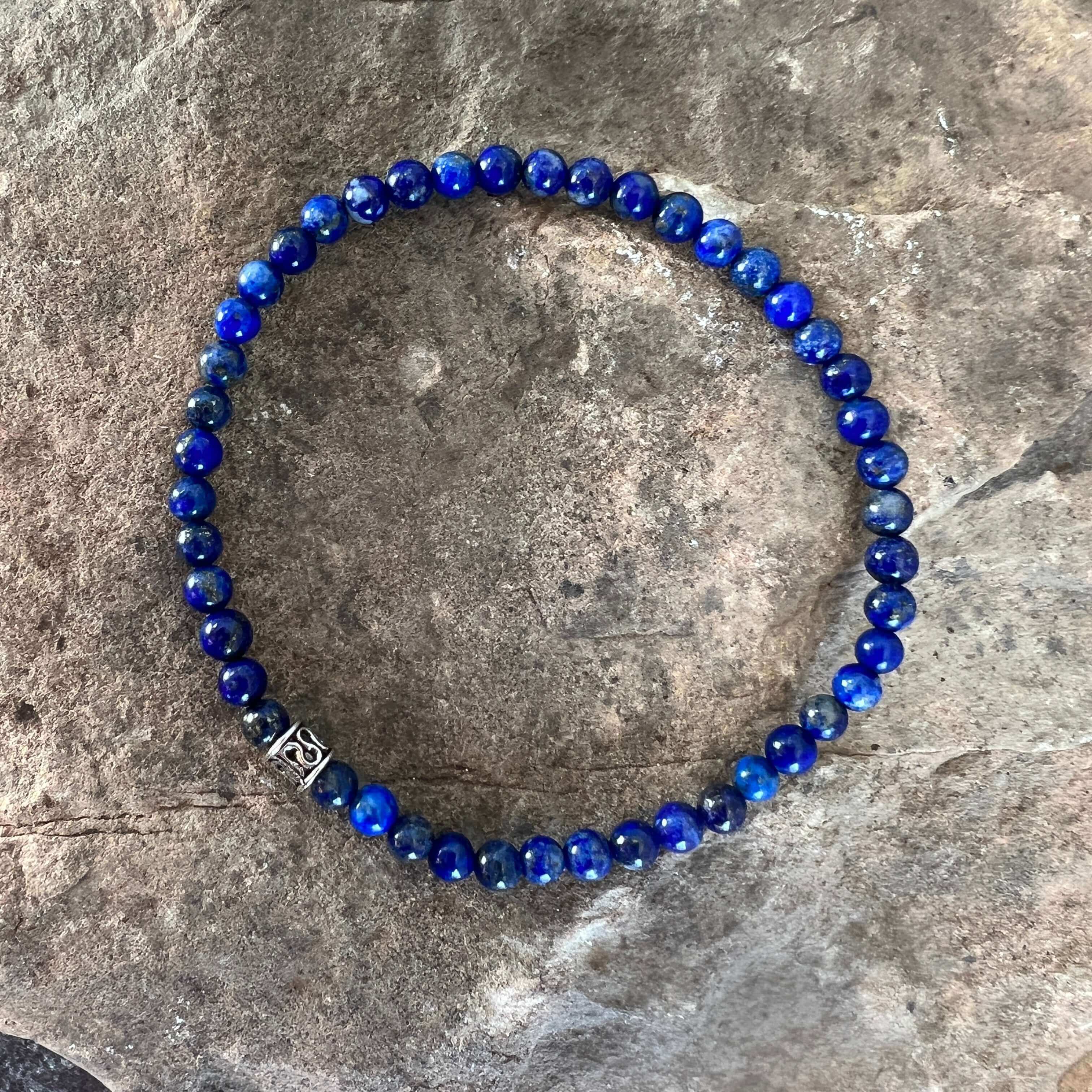 Lapis Lazuli Bead Bracelet This bracelet is made with high-quality Lapis Lazuli stones which bring wisdom to the wearer. Zodiac: Sagittarius and Libra. Chakras: Third Eye, Crown, and Throat. Handmade with authentic crystals & gemstones in Minneapolis, MN.