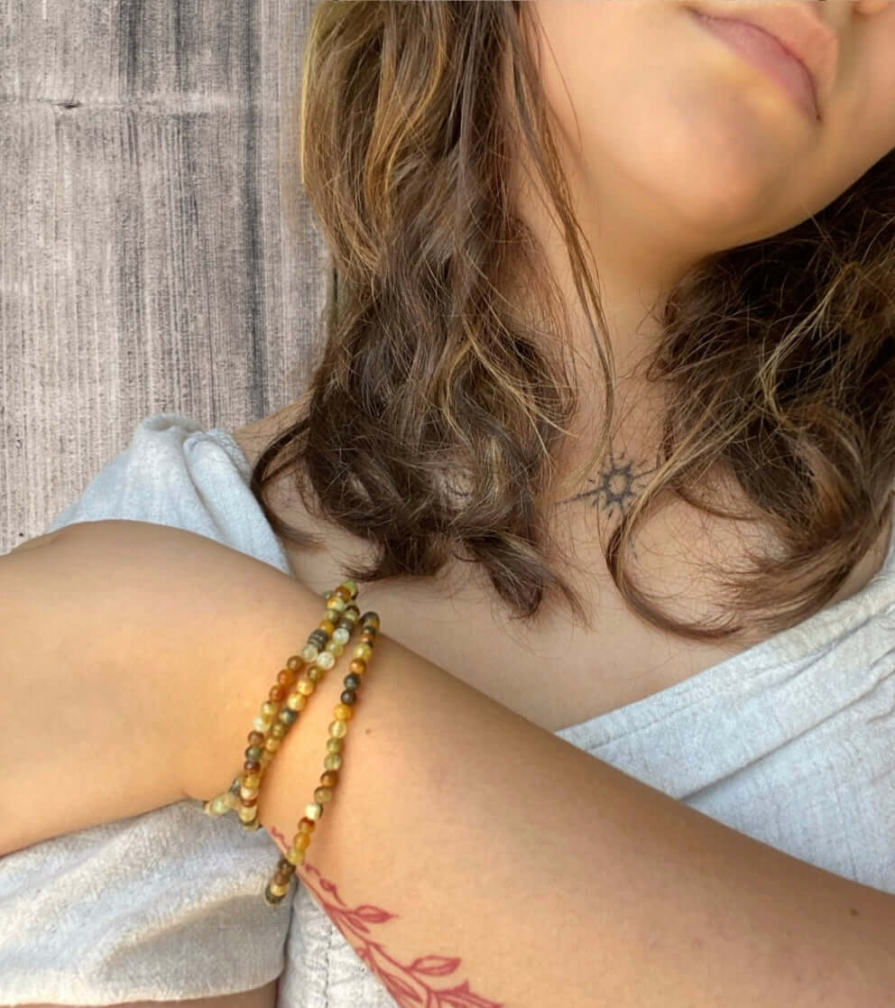 Flower Jade Mini Bead Bracelet This bracelet is made with high-quality Flower Jade stones which bring balance to the wearer. Zodiac Signs: Aries, Taurus, Gemini, and Libra. Chakra: Heart and Solar Plexus. Handmade with authentic crystals and gemstones in