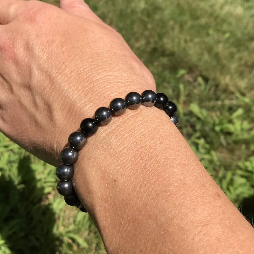 Hematite and Black Obsidian Bead Bracelet This bracelet is made with high-quality Hematite and Black Obsidian stones which bring balance and self-awareness to the wearer. Zodiac Signs: Aquarius, Aries, and Scorpio. Chakras: Root. Handmade with authentic c