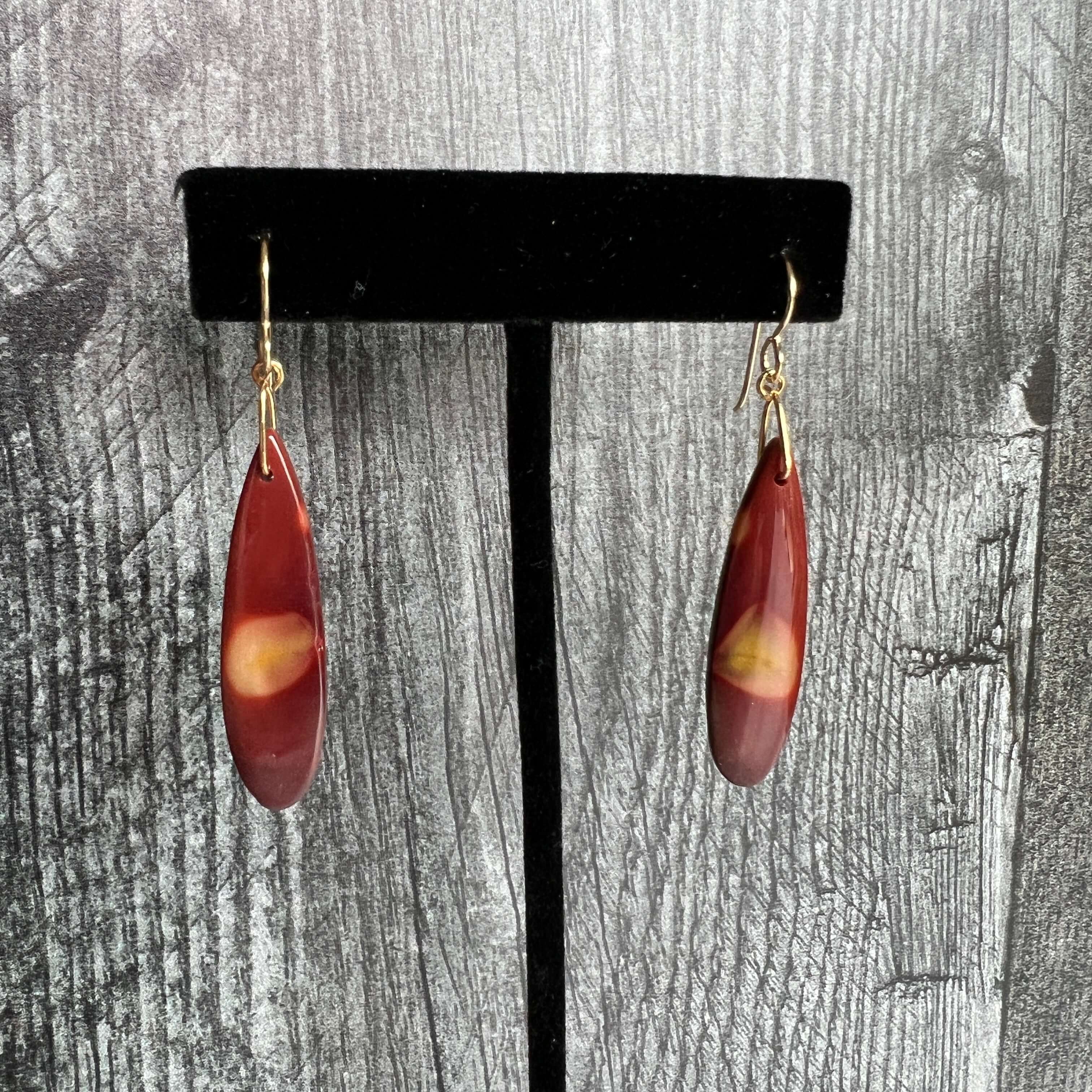 Mookaite Jasper Earrings These earrings are made with high-quality Mookaite gemstones which bring perspective to the wearer. Zodiac Signs: Virgo and Scorpio. Chakras: Root, Sacral, and Solar Plexus. Handmade with authentic crystals & gemstones in Minneapo