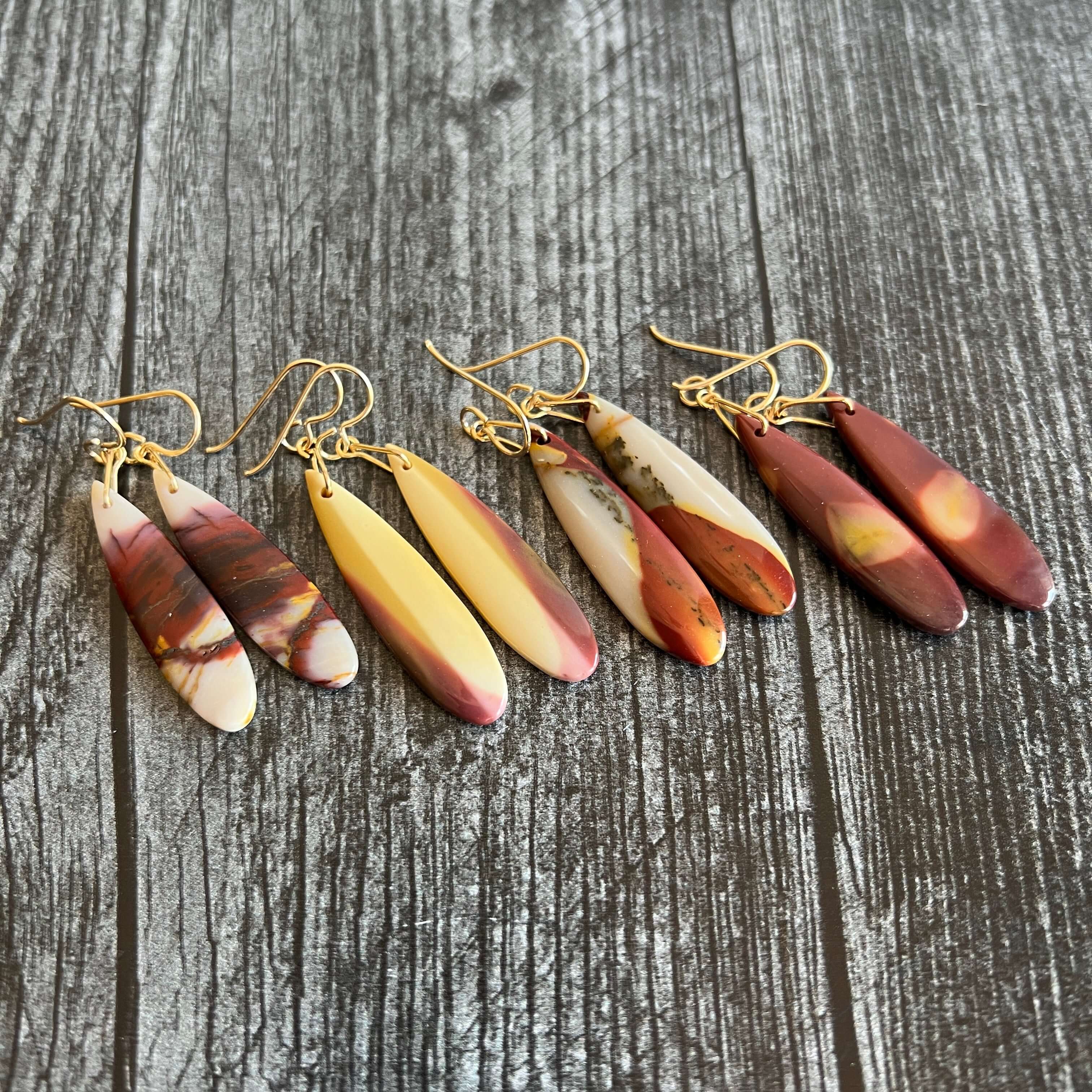 Mookaite Jasper Earrings These earrings are made with high-quality Mookaite gemstones which bring perspective to the wearer. Zodiac Signs: Virgo and Scorpio. Chakras: Root, Sacral, and Solar Plexus. Handmade with authentic crystals & gemstones in Minneapo