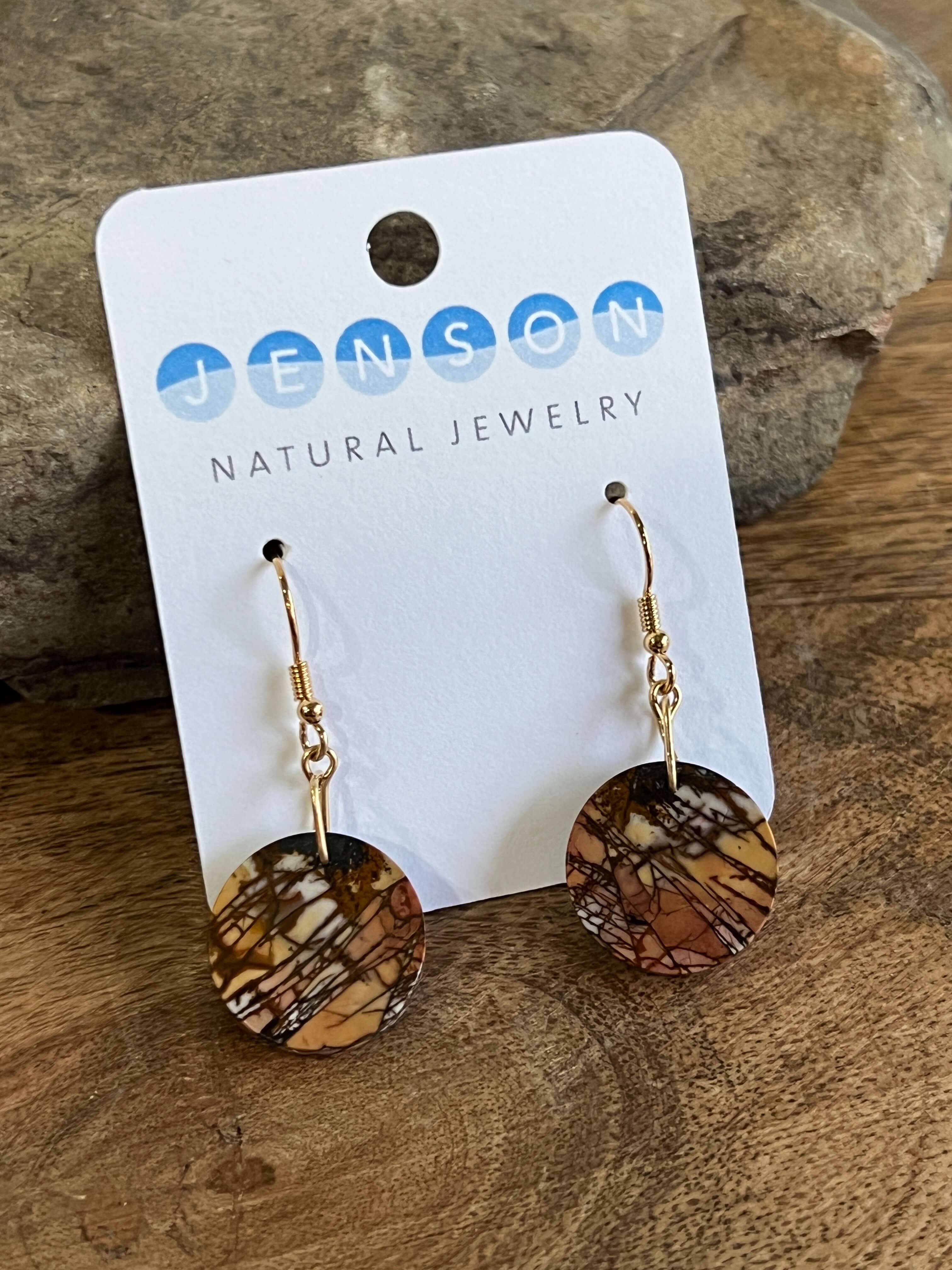 Red Creek Jasper Circle Earrings These earrings are made with high-quality Red Creek Jasper gemstones which bring balancing energy to the wearer. Zodiac Signs: Aries, Scorpio Chakras: Root, Sacral. Handmade with authentic crystals & gemstones in Minneapol