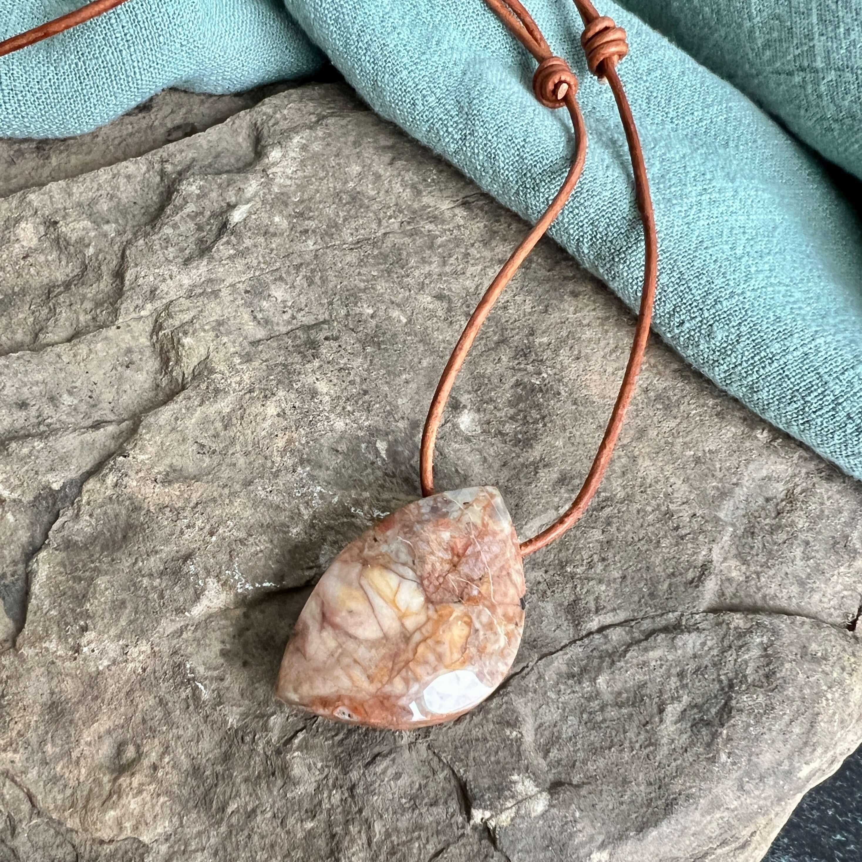 Venus Jasper Slide Knot Necklace This necklace is made with Venus Jasper gemstones which help ground and strengthen the wearer. Venus Jasper is a stone which inspires feelings of strength and stability in the wearer. Named after the Roman Goddess of of lo