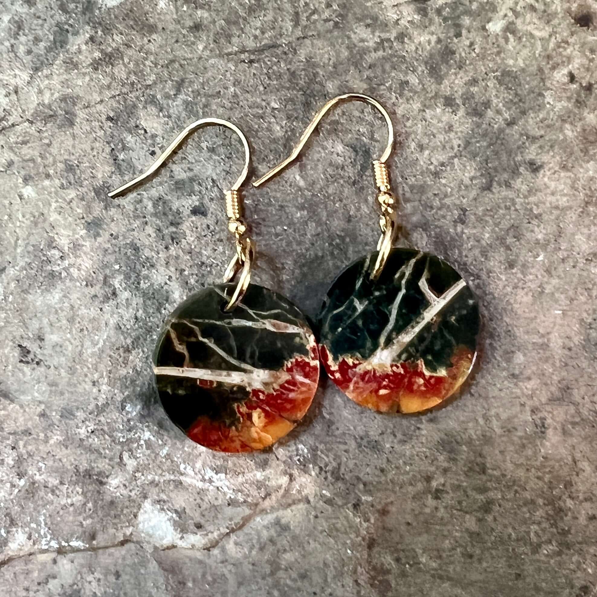 Red Creek Jasper Circle Earrings These earrings are made with high-quality Red Creek Jasper gemstones which bring balancing energy to the wearer. Zodiac Signs: Aries, Scorpio Chakras: Root, Sacral. Handmade with authentic crystals & gemstones in Minneapol