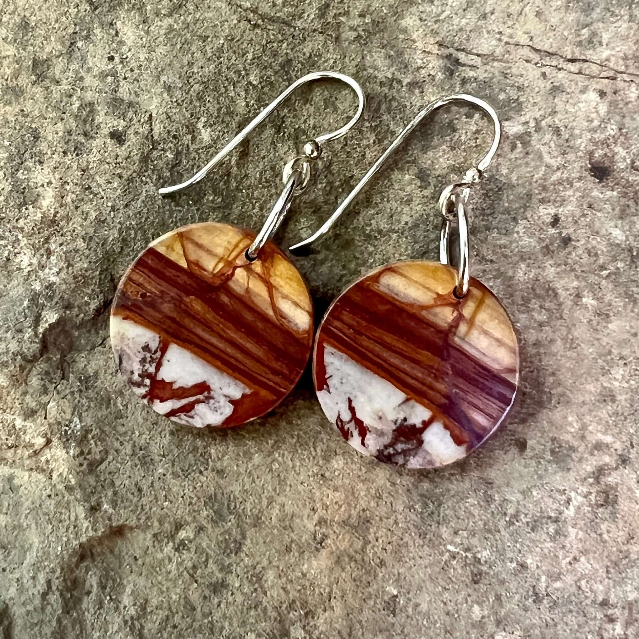 Red Creek Jasper Circle Earrings These earrings are made with high-quality Red Creek Jasper gemstones which bring balancing energy to the wearer. Zodiac Signs: Aries, Scorpio Chakras: Root, Sacral. Handmade with authentic crystals & gemstones in Minneapol