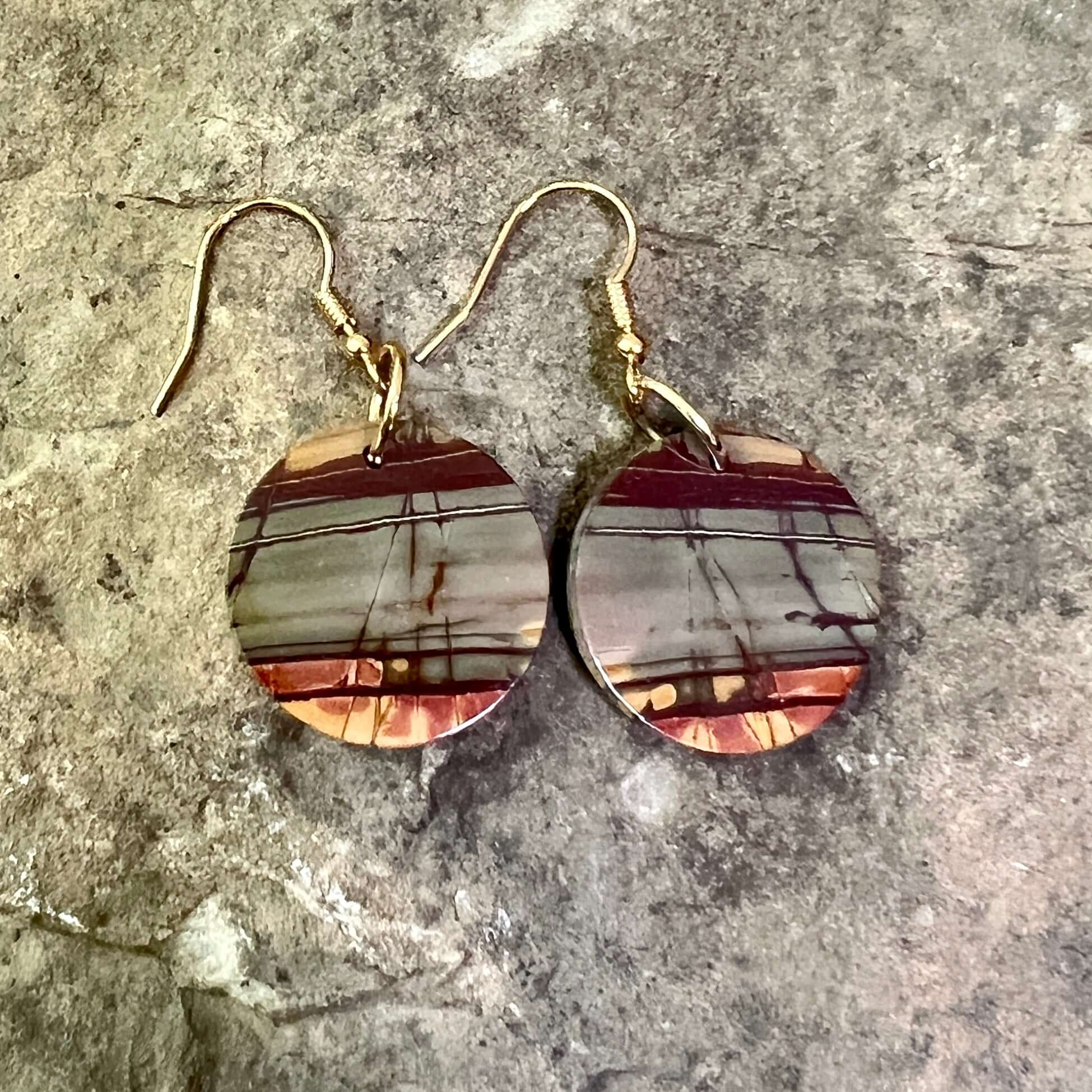 Red Creek Jasper Circle Earrings These earrings are made with high-quality Red Creek Jasper gemstones which bring balancing energy to the wearer. Zodiac Signs: Aries, Scorpio Chakras: Root, Sacral. Handmade with authentic crystals & gemstones in Minneapol