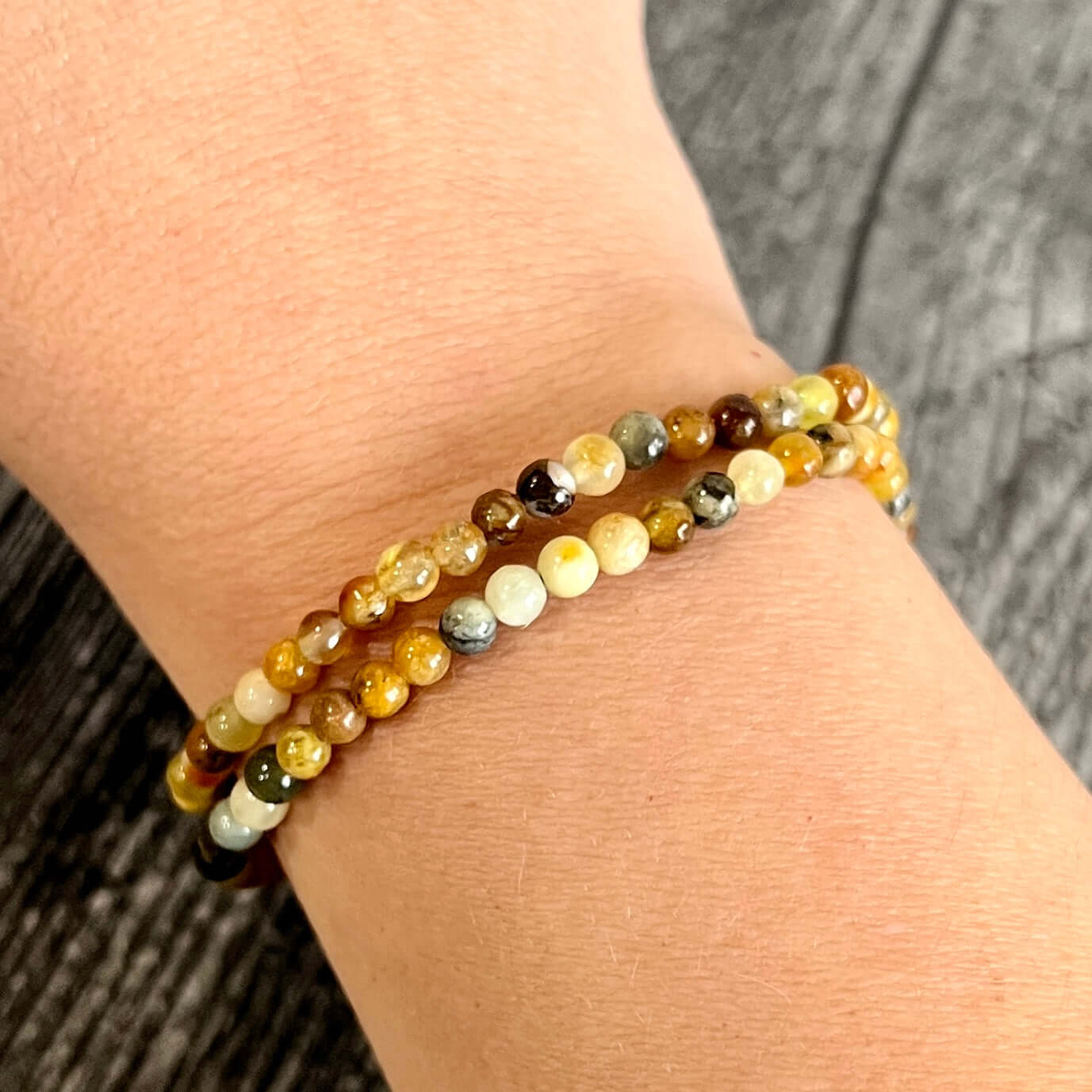 Flower Jade Mini Bead Bracelet This bracelet is made with high-quality Flower Jade stones which bring balance to the wearer. Zodiac Signs: Aries, Taurus, Gemini, and Libra. Chakra: Heart and Solar Plexus. Handmade with authentic crystals and gemstones in