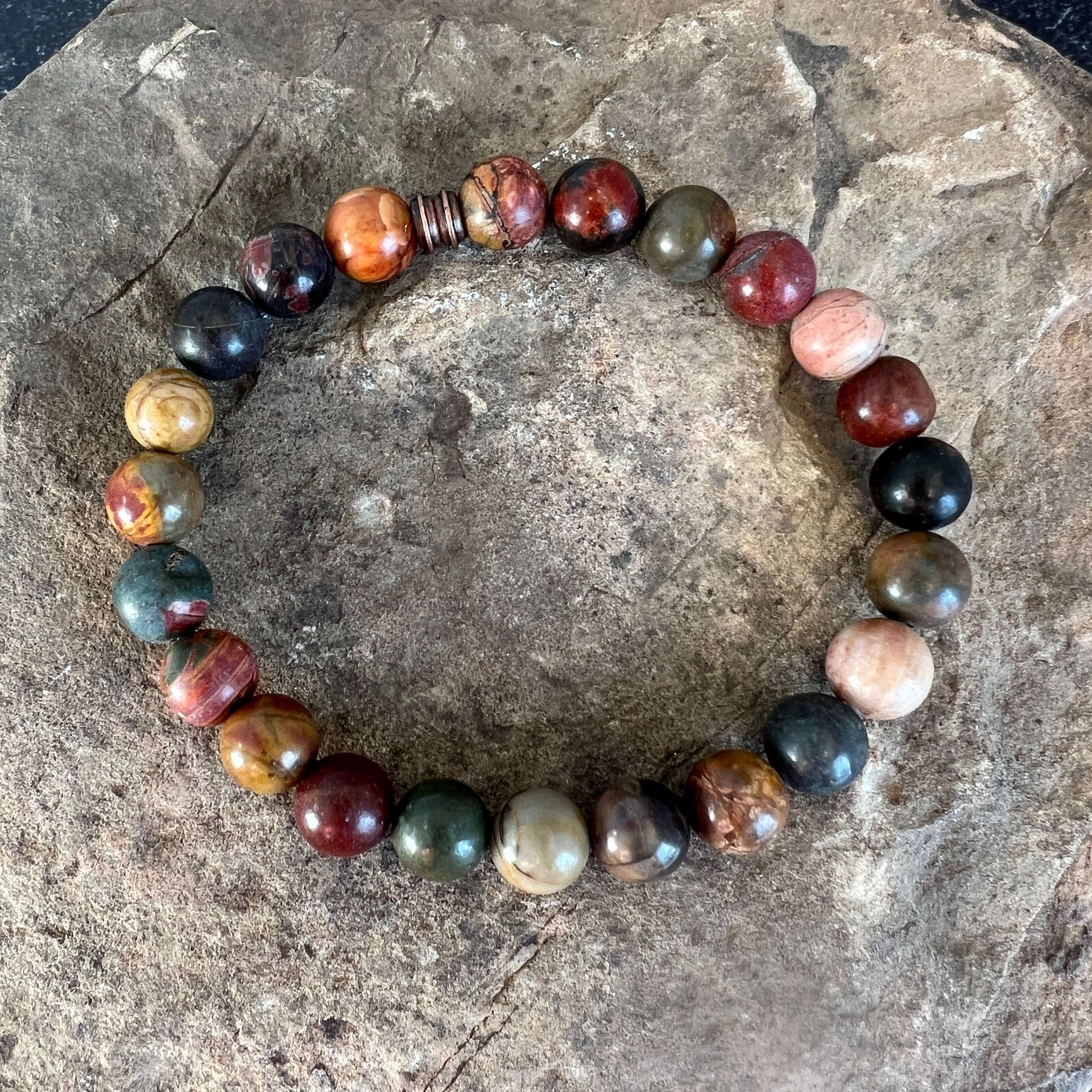 Red Creek Jasper Bracelet This bracelet is made with high-quality Red Creek Jasper gemstones which bring grounding energy to the wearer. Zodiac Signs: Aries and Scorpio. Chakras: Root and Sacral. Handmade with authentic crystals & gemstones in Minneapolis