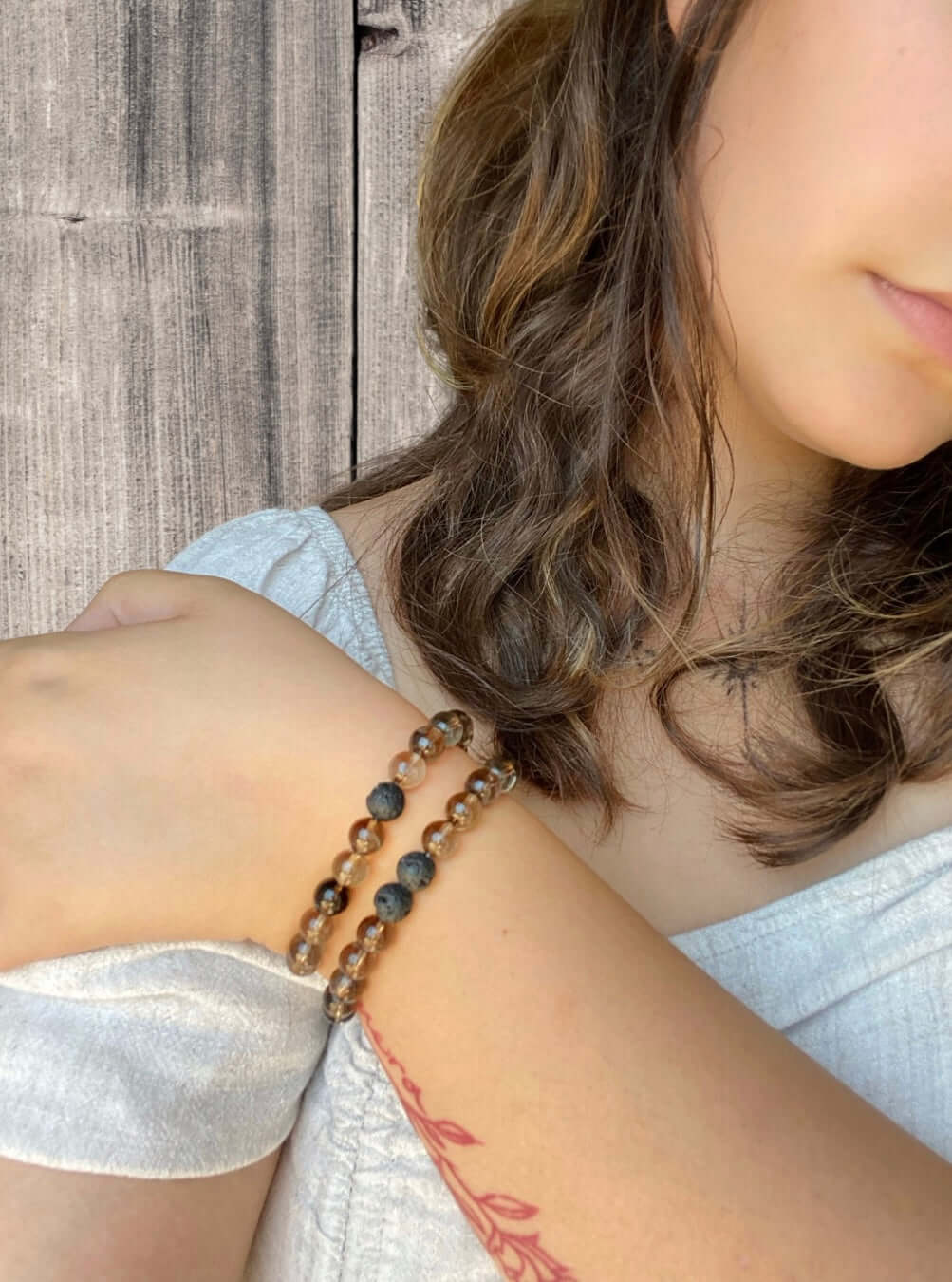 Smoky Quartz Bracelet This bracelet is made with high-quality Smoky Quartz gemstones which bring stress relief and protection from negativity to the wearer. Zodiac Signs: Scorpio, Sagittarius, and Capricorn. Chakras: Root and Solar Plexus. Handmade with a