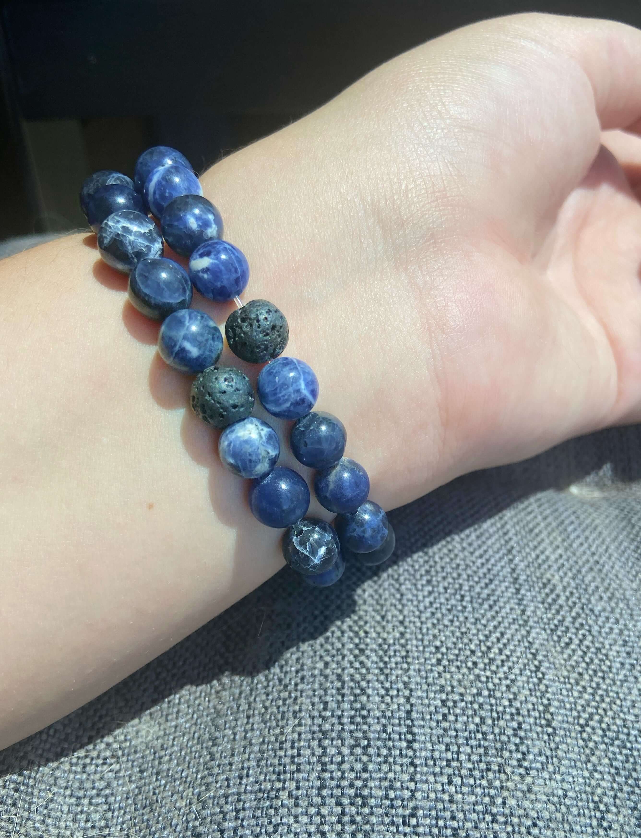 Sodalite Bracelet This bracelet is made with high-quality Sodalite gemstones which bring logic and intuition to the wearer. Zodiac Signs: Virgo and Sagittarius. Chakras: Throat and Third Eye. Handmade with authentic crystals & gemstones in Minneapolis, MN