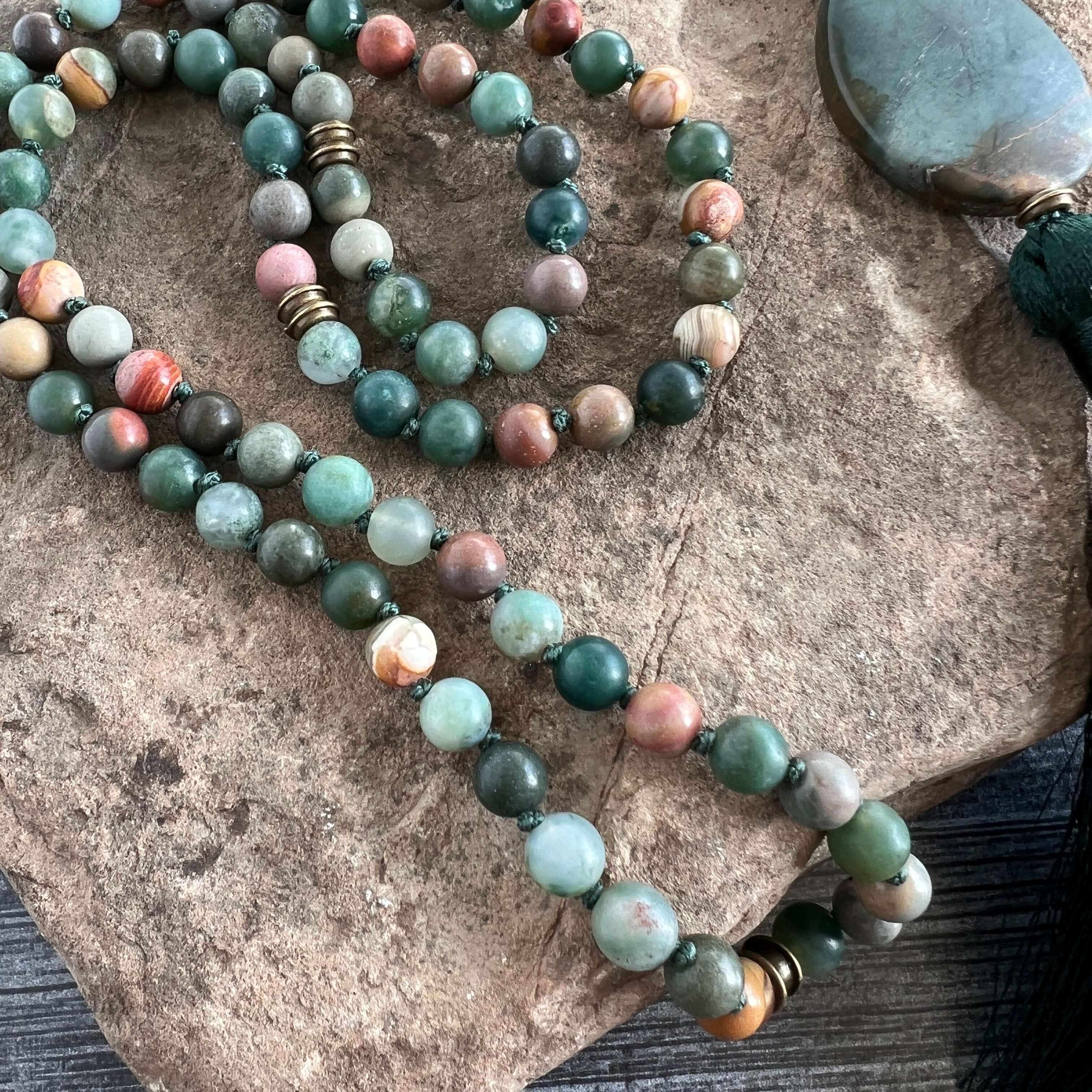 Forest Walk Mala This mala is made with high-quality Agate and Jasper gemstones which bring strength and tranquility to the wearer. Zodiac Signs: Leo, Gemini, Aries, Scorpio, and Virgo. Chakras: Third Eye, Root, Crown, and Heart. Handmade with authentic c