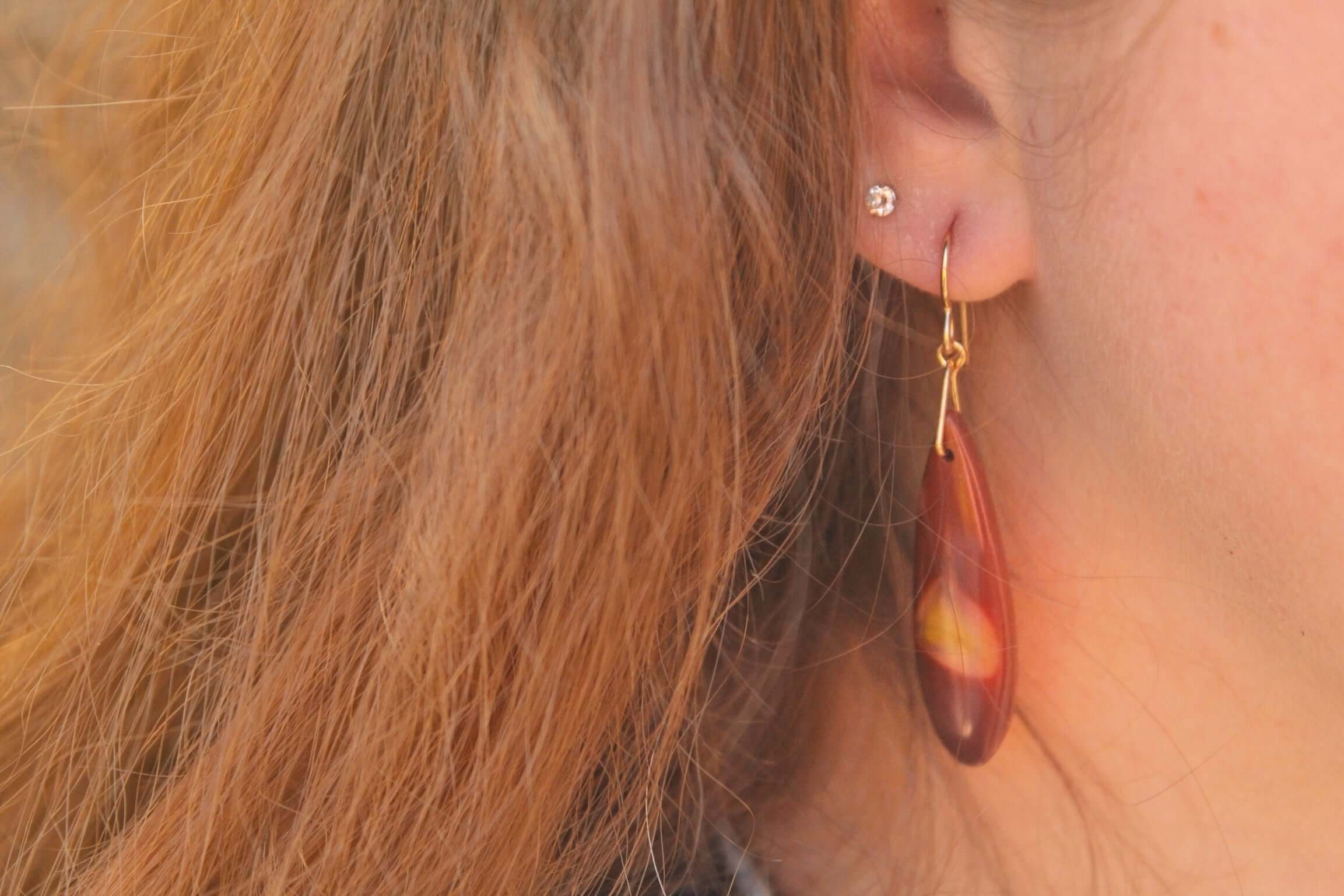 Mookaite Jasper Earrings These earrings are made with high-quality Mookaite gemstones which bring perspective to the wearer. Zodiac Signs: Virgo and Scorpio. Chakras: Root, Sacral, and Solar Plexus. Handmade with authentic crystals & gemstones in Minneapo