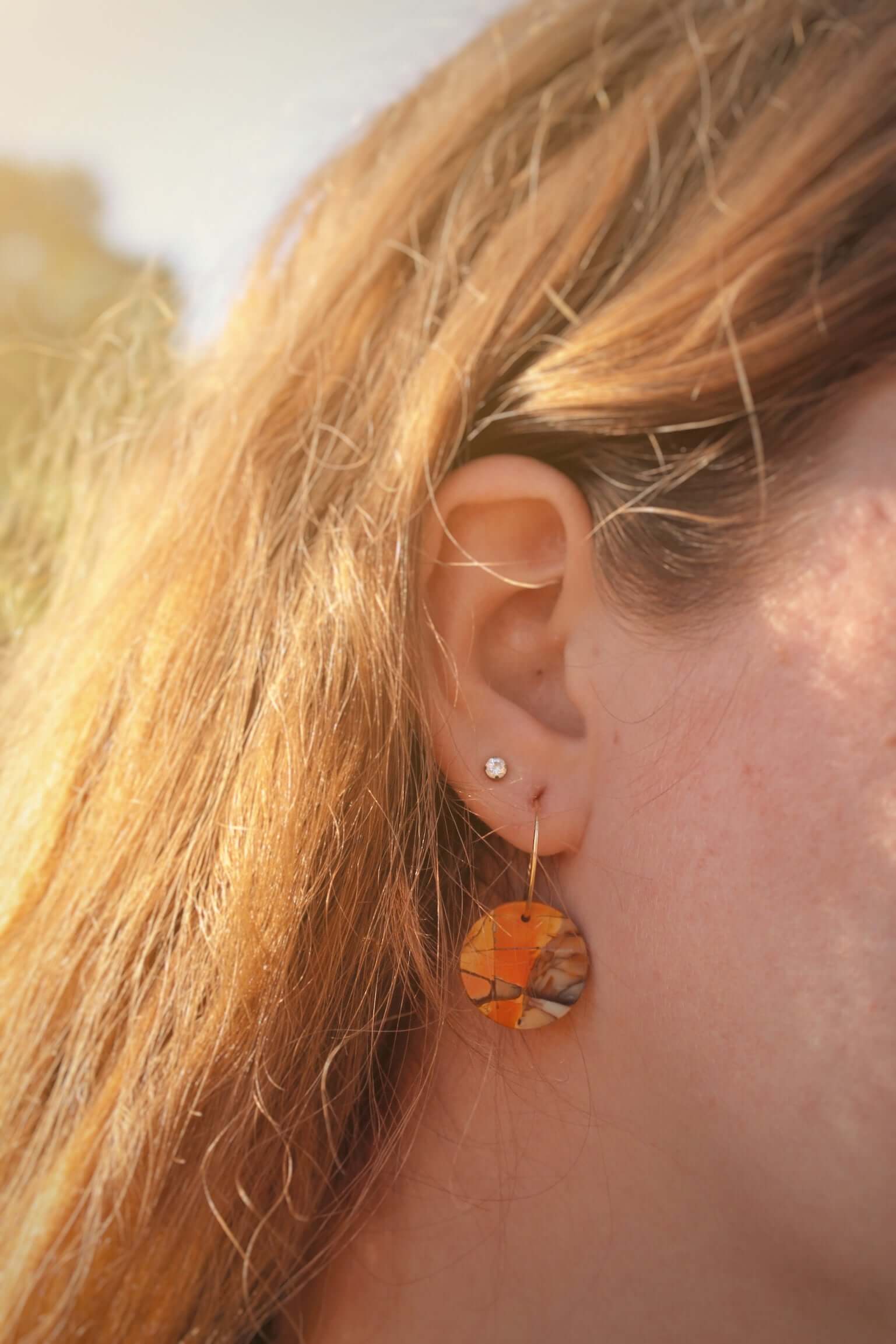 Red Creek Jasper Circle Earrings These earrings are made with high-quality Red Creek Jasper gemstones which bring balancing energy to the wearer. Zodiac Signs: Aries, Scorpio Chakras: Root, Sacral. Handmade with authentic crystals & gemstones in Minneapol