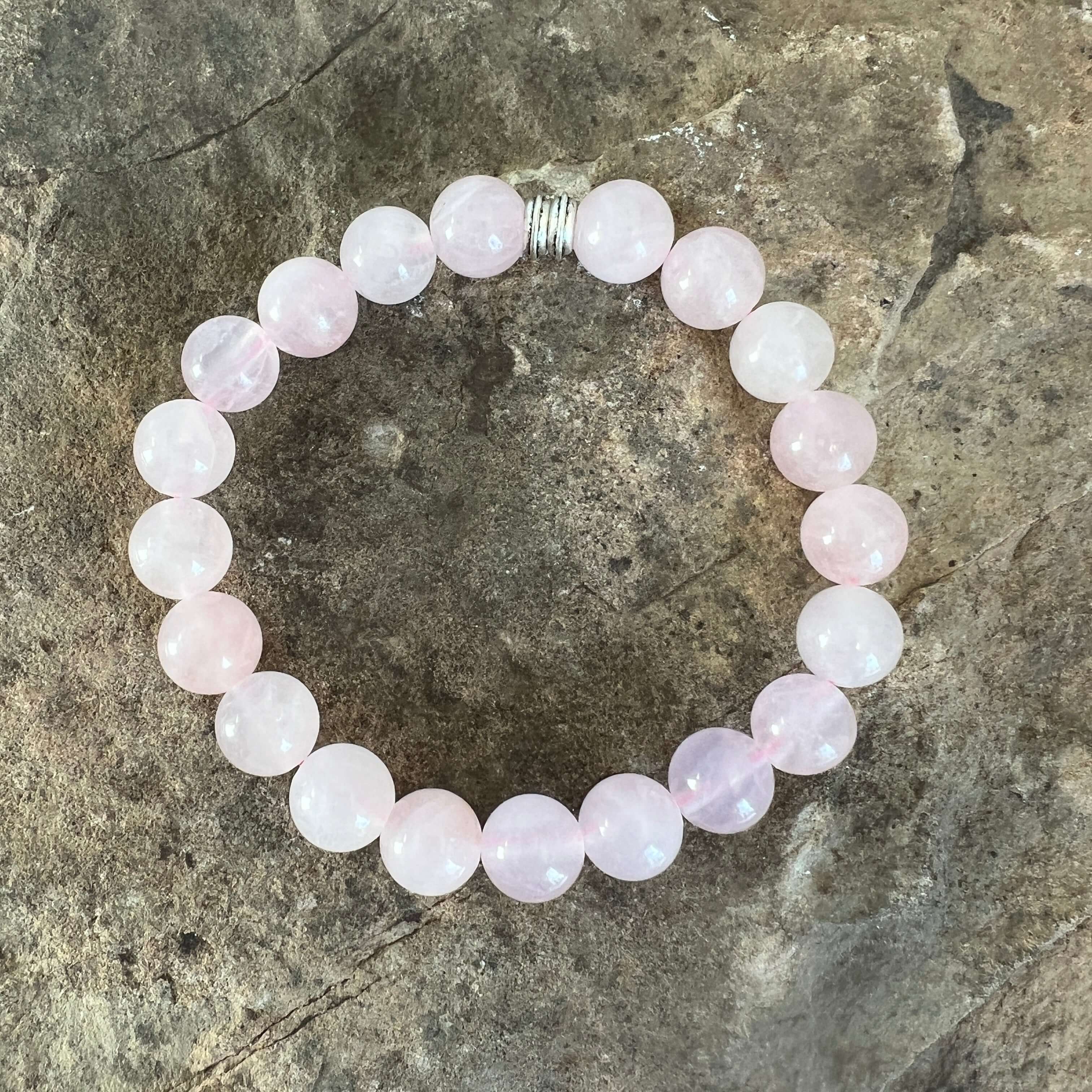 Rose Quartz Bead Bracelet This bracelet is made with high-quality Rose Quartz gemstones which bring love and purification to the wearer. Zodiac Sign: Taurus. Chakra: Heart. Handmade with authentic crystals & gemstones in Minneapolis, MN.